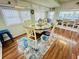 Dining area with glass table and chair seating, next to a serving area and office nook at 6001 - 1599 S Kings Hwy., Myrtle Beach, SC 29575