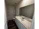 Modern bathroom with vanity, sink, mirror, and shower with tub at 623 Muster Field Ct., Conway, SC 29526