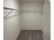 An organized closet space featuring sturdy wire shelving and neutral carpeting to complement any wardrobe at 623 Muster Field Ct., Conway, SC 29526