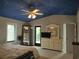 Relaxing bedroom featuring a ceiling fan, carpet flooring, and a dresser at 69 Sea Level Loop, Pawleys Island, SC 29585