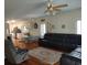 Open-concept living area with hardwood floors, cozy furniture, and a bright, airy atmosphere at 69 Sea Level Loop, Pawleys Island, SC 29585