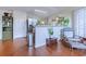 Beautiful home design featuring hardwood floors and an open floor plan that seamlessly connects the living and kitchen areas at 834 Holly Sands Blvd., Little River, SC 29566