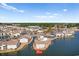 Scenic aerial view of South Bay Lakes and its stunning pond with community pool at 8835 Chandler Dr. # E, Myrtle Beach, SC 29575