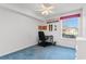 Minimalist bedroom with a study desk, a chair and a view of the exterior at 8835 Chandler Dr. # E, Myrtle Beach, SC 29575