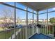 View from the enclosed patio towards the community and pond at 8835 Chandler Dr. # E, Myrtle Beach, SC 29575