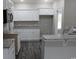 Modern kitchen featuring stainless steel appliances, granite countertops, and white cabinetry at Tbd5 Persimmon Rd., Aynor, SC 29511