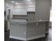 Stylish kitchen with granite countertops, white cabinets, and breakfast bar at Tbd5 Persimmon Rd., Aynor, SC 29511