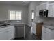 Well-equipped kitchen with granite counters, stainless steel appliances, and ample cabinet space at Tbd5 Persimmon Rd., Aynor, SC 29511