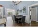 Cozy dining room with views to backyard and stylish decor at 1021 Myrtle Dr., Surfside Beach, SC 29575