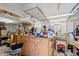 Well-lit and organized garage workshop area with a workbench, tools, and ample storage for projects and hobbies at 1021 Myrtle Dr., Surfside Beach, SC 29575