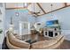 Bright and airy living room featuring vaulted ceilings and large windows, perfect for relaxation at 1021 Myrtle Dr., Surfside Beach, SC 29575