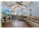 Spacious open-concept living room with vaulted ceilings, hardwood floors, and a cozy atmosphere at 1021 Myrtle Dr., Surfside Beach, SC 29575