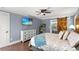 Relaxing main bedroom with a barn door to the bathroom and plenty of natural light at 1021 Myrtle Dr., Surfside Beach, SC 29575