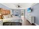 Comfortable main bedroom featuring a mounted TV and direct access to the outdoors at 1021 Myrtle Dr., Surfside Beach, SC 29575