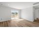 Bright living room with sliding glass doors to the outside and wood flooring at 1028 Kinness Dr., Conway, SC 29527