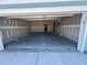 Spacious two-car garage with drywall and concrete flooring at 1213 Lady Bird Way, North Myrtle Beach, SC 29582
