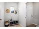 Functional mudroom with cubby storage, a window, and stylish decor accents at 215 Warner Crossing Way, Loris, SC 29569