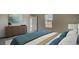 Cozy bedroom with modern dresser and view to the outside at 216 Warner Crossing Way, Loris, SC 29569