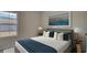 Inviting bedroom with neutral tones, a comfortable bed, and ample natural light from the large window at 216 Warner Crossing Way, Loris, SC 29569