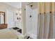 Bathroom showing shower, decoratively tiled floors and a double sink vanity at 224 Je Edward Dr. # 17, Myrtle Beach, SC 29588