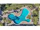 Aerial view of the community pool featuring many seats and tables for residents at 224 Je Edward Dr. # 17, Myrtle Beach, SC 29588