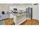 Well-appointed kitchen featuring stainless steel appliances, granite countertops, a pantry and an island at 224 Je Edward Dr. # 17, Myrtle Beach, SC 29588