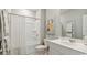 Clean bathroom includes a shower-tub combo, white vanity, and neutral decor at 224 Warner Crossing Way, Loris, SC 29569