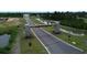 Aerial shot showcasing the Auberon Woods entrance surrounded by lush greenery and scenic landscapes at 305 Glacier Way, Conway, SC 29526