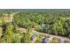 Great aerial view of a cozy single Gathering home nestled among mature trees at 3096 Hugo Rd., Conway, SC 29527