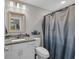 Bathroom featuring granite countertop vanity and tub with shower at 3096 Hugo Rd., Conway, SC 29527