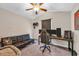 Bedroom featuring ceiling fan, window, leather couch, and gaming setup at 3096 Hugo Rd., Conway, SC 29527