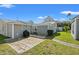 Home with a patio, grill, grassy yard, and a walkway at 319 Sparrow Dr., Surfside Beach, SC 29575