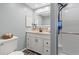 Bathroom featuring vanity with drawers and a walk-in shower at 319 Sparrow Dr., Surfside Beach, SC 29575