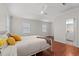 This bedroom features white walls, wood flooring, and natural light at 319 Sparrow Dr., Surfside Beach, SC 29575