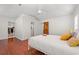 Large primary bedroom showcasing private entrance to closet and bathroom at 319 Sparrow Dr., Surfside Beach, SC 29575