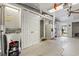 Spacious garage with white walls and an abundance of storage cabinets and shelving at 319 Sparrow Dr., Surfside Beach, SC 29575