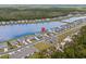 Wonderful aerial view of the home near a lake and surrounded by lush greenery and other homes at 3549 Bells Lake Circle, Longs, SC 29568