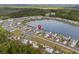 Beautiful aerial view of home situated near a lake featuring tree-lined streets at 3549 Bells Lake Circle, Longs, SC 29568