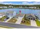 Aerial view of home located on a street with a lake view featuring a well manicured front lawn at 3549 Bells Lake Circle, Longs, SC 29568