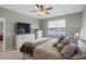 Cozy bedroom featuring a large dresser, soft carpet, and a serene view from the window at 3549 Bells Lake Circle, Longs, SC 29568