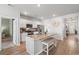 Open kitchen boasts granite counters, stainless appliances, and a breakfast bar with seating at 3549 Bells Lake Circle, Longs, SC 29568