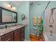 Bathroom featuring granite counters, and a shower and tub combination at 4520 Hedrick St., North Myrtle Beach, SC 29582