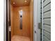 Private elevator with wood paneling provides convenient access between floors within the home at 4520 Hedrick St., North Myrtle Beach, SC 29582