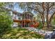 Charming raised beach house with a screened porch and ample parking underneath at 4520 Hedrick St., North Myrtle Beach, SC 29582