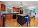 Bright kitchen with stainless steel appliances, wood cabinets, and a large island at 4520 Hedrick St., North Myrtle Beach, SC 29582
