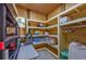A functional storage room with custom shelving units, providing a tidy and organized space for home essentials at 4520 Hedrick St., North Myrtle Beach, SC 29582
