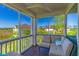 Cozy balcony offers seating and views of waterway at 4560 Greenbriar Dr. # 306B, Little River, SC 29566