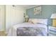 Comfortable bedroom featuring patterned wallpaper and a cozy bed at 4560 Greenbriar Dr. # 306B, Little River, SC 29566