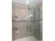 Modern shower with glass doors and tiled walls at 4560 Greenbriar Dr. # 306B, Little River, SC 29566