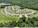 Aerial of new construction community with neighborhood layout and nearby waterway at 476 Honeyhill Loop, Conway, SC 29526